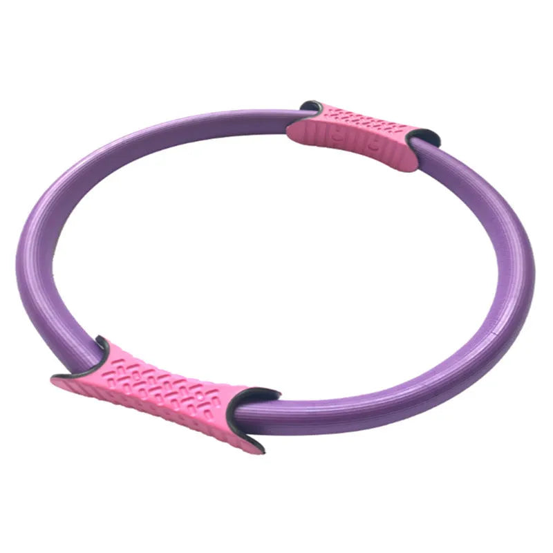 Purple Pilates ring 38cm diameter on a white background for yoga and fitness workouts