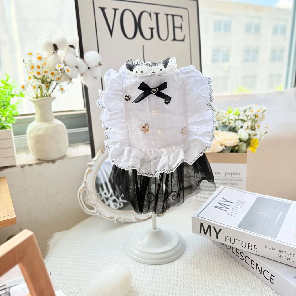 White yarn princess-style Waltz gauze skirt costume on a small dog, showing tiered design.