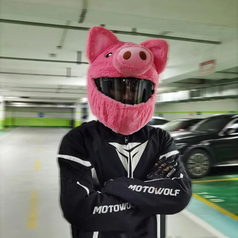 Pink pig cartoon plush helmet protective hood for motorcycle helmets with matching sleeve.