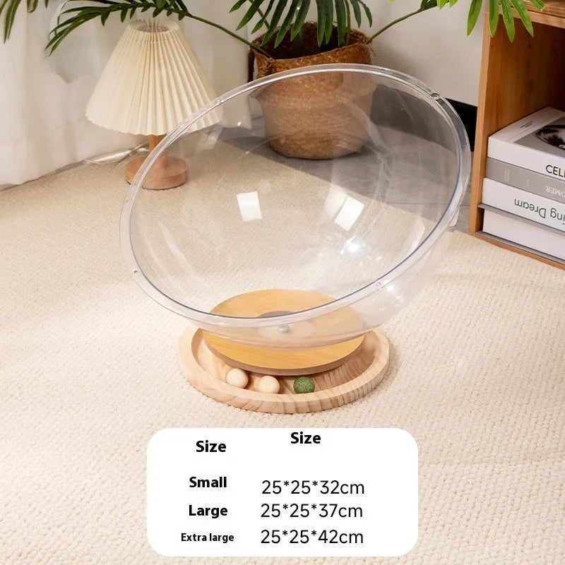 Transparent acrylic space capsule shaped cat bed on a turntable base, shown in a large size.