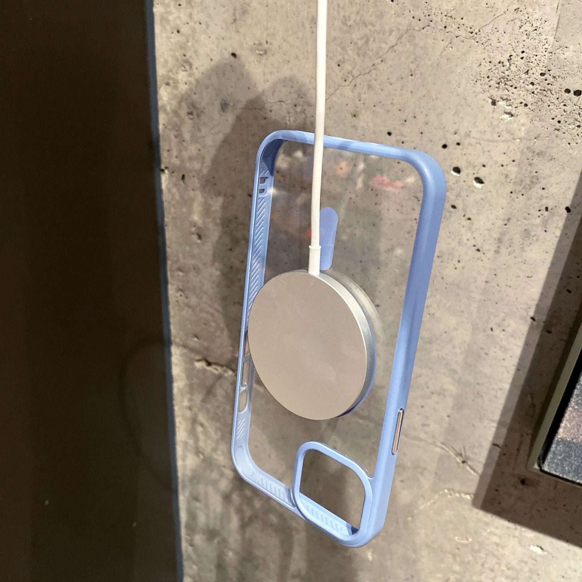 Transparent acrylic Magsafe phone case for iPhone with magnetic ring, shown in multiple colour options