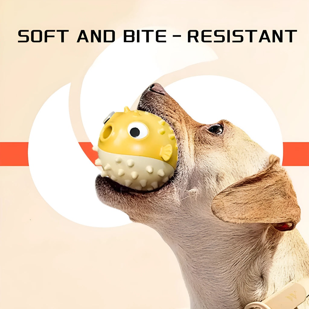 Yellow fish-shaped dog chew toy with textured surface and squeaker function