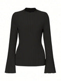 Long sleeve slim fit top with lantern sleeves and sunken stripe pattern in polyester fabric
