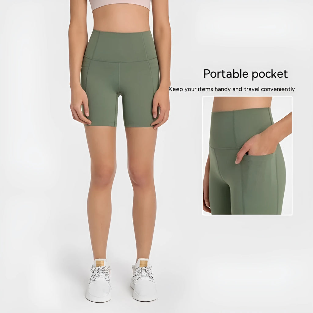 Women's solid colour sports shorts in a cotton blend fabric with super stretch, shown in a mid-length fit.