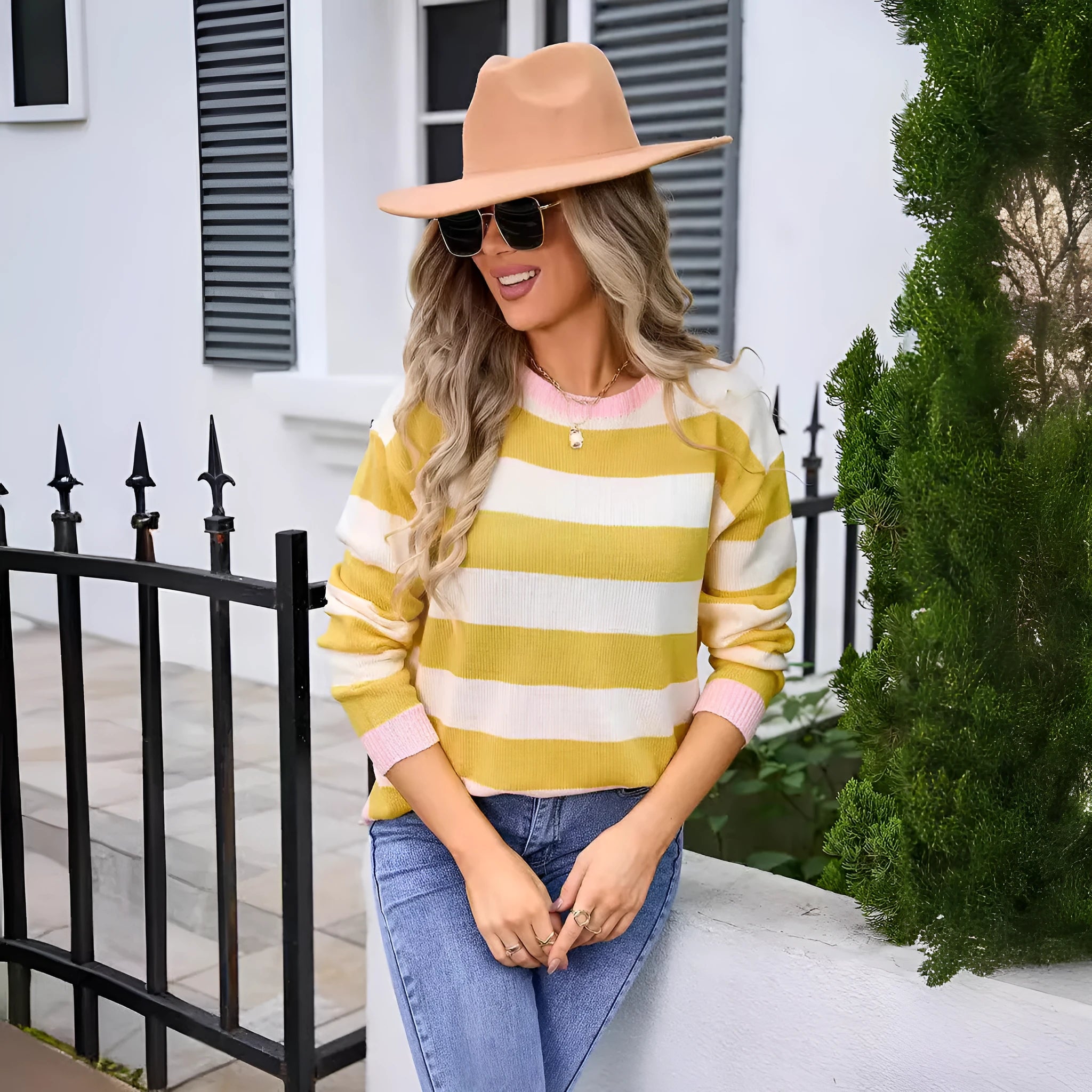 Women's loose fit acrylic sweater with long sleeves in striped or plaid pattern, colours: khaki, yellow, orange, pink, blue.
