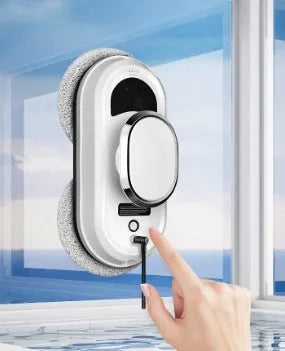 White automatic high-altitude window cleaning machine with remote control and cleaning cloths.