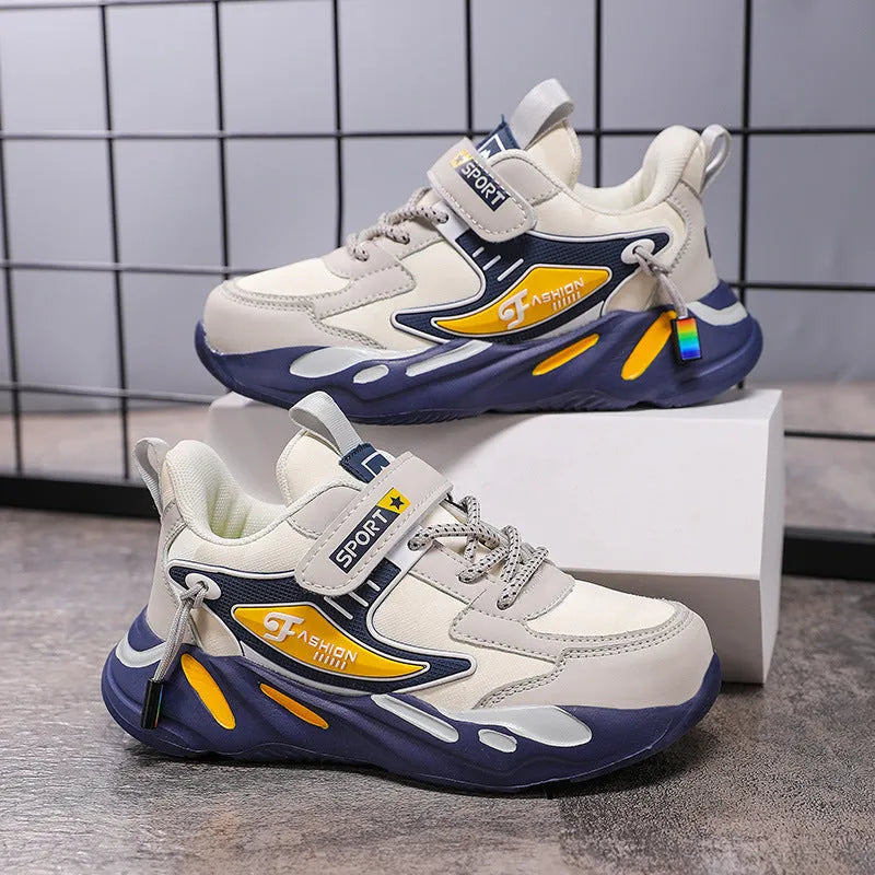 Boys dark blue and beige sports running shoes with Velcro strap and mesh upper.