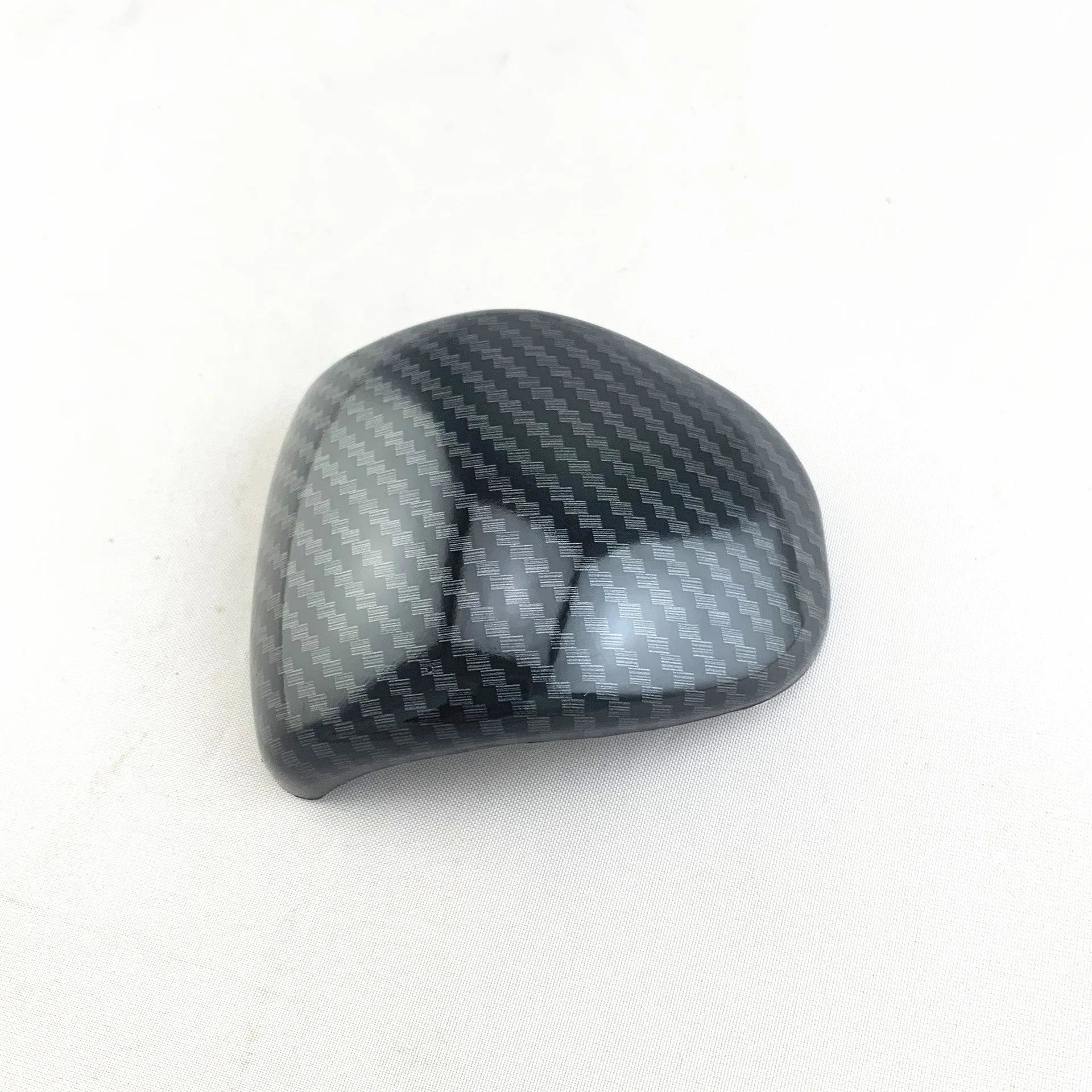 Smart RunK3 gear shift cover in carbon fibre pattern made from black ABS plastic.