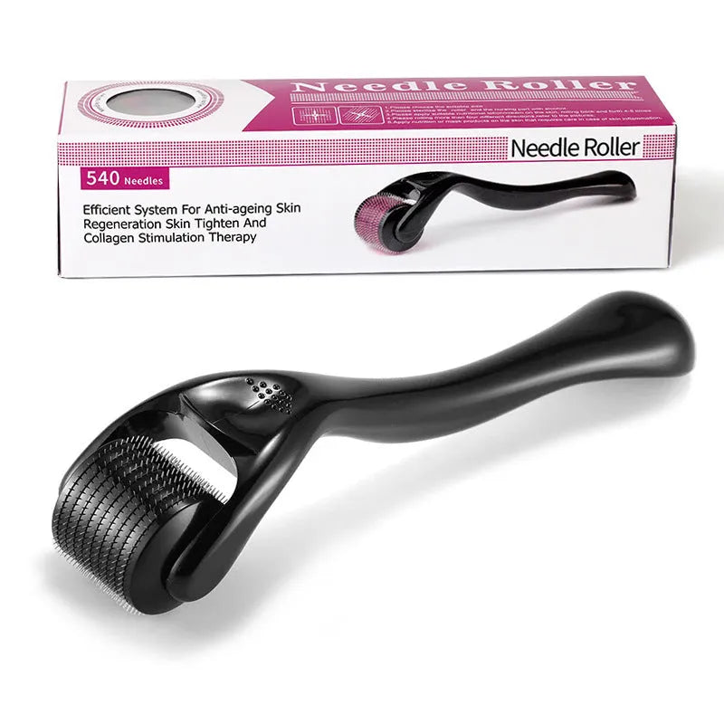 Close-up of a titanium derma roller with black handle showing the 540 needle head.