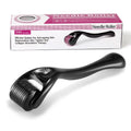 Close-up of a titanium derma roller with black handle showing the 540 needle head.