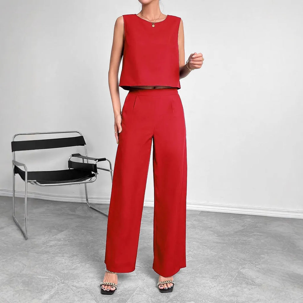 Women's red polyester two-piece set with sleeveless top and wide leg trousers