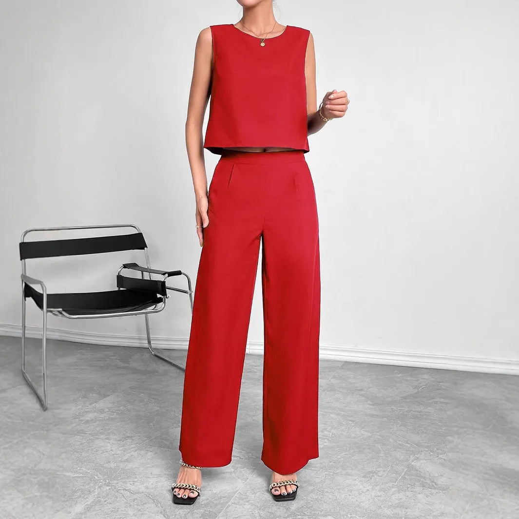 Women's red polyester two-piece set with sleeveless top and wide leg trousers