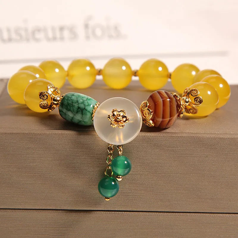 Women's yellow agate crystal bracelet with gold silk thread in khaki color