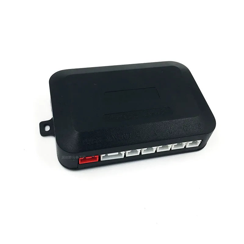 Four ultrasonic parking sensors and a buzzer control unit for a car reversing radar system.