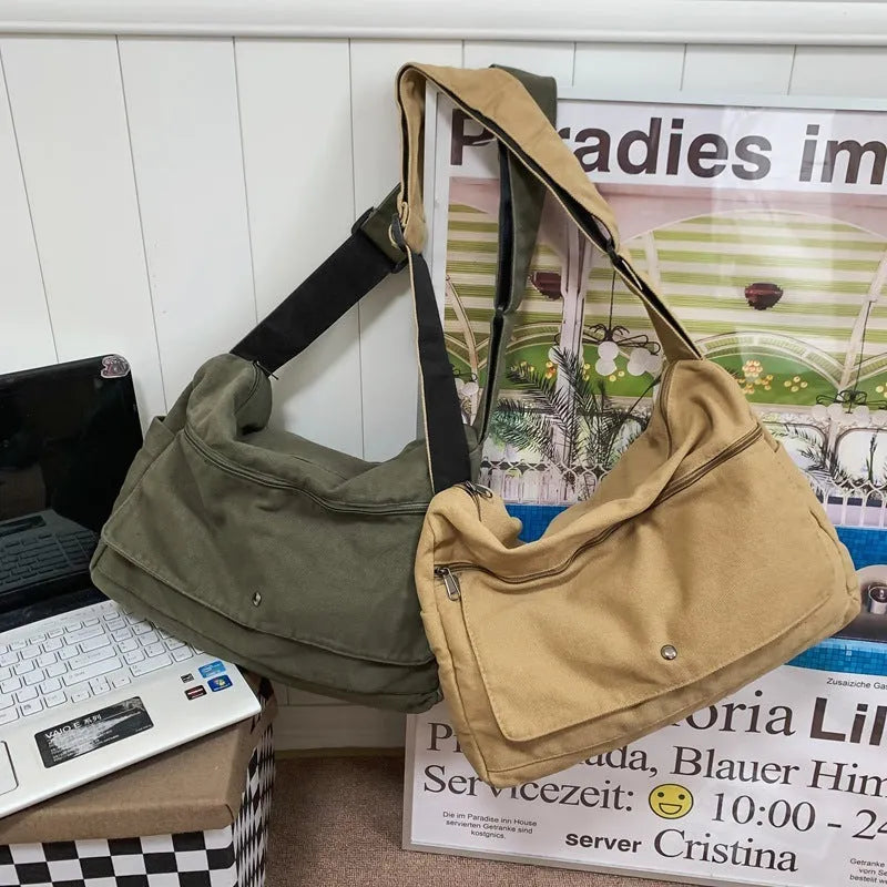 Washed canvas draping women's crossbody bag in black soft horizontal square shape