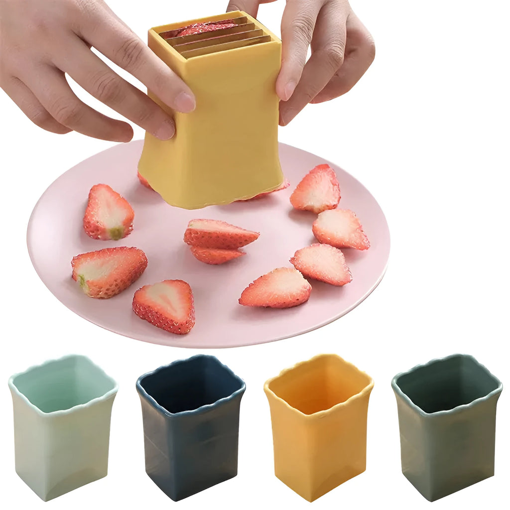 Green stainless steel cup slicer for fruit and vegetable cutting with compact design and visible blade area