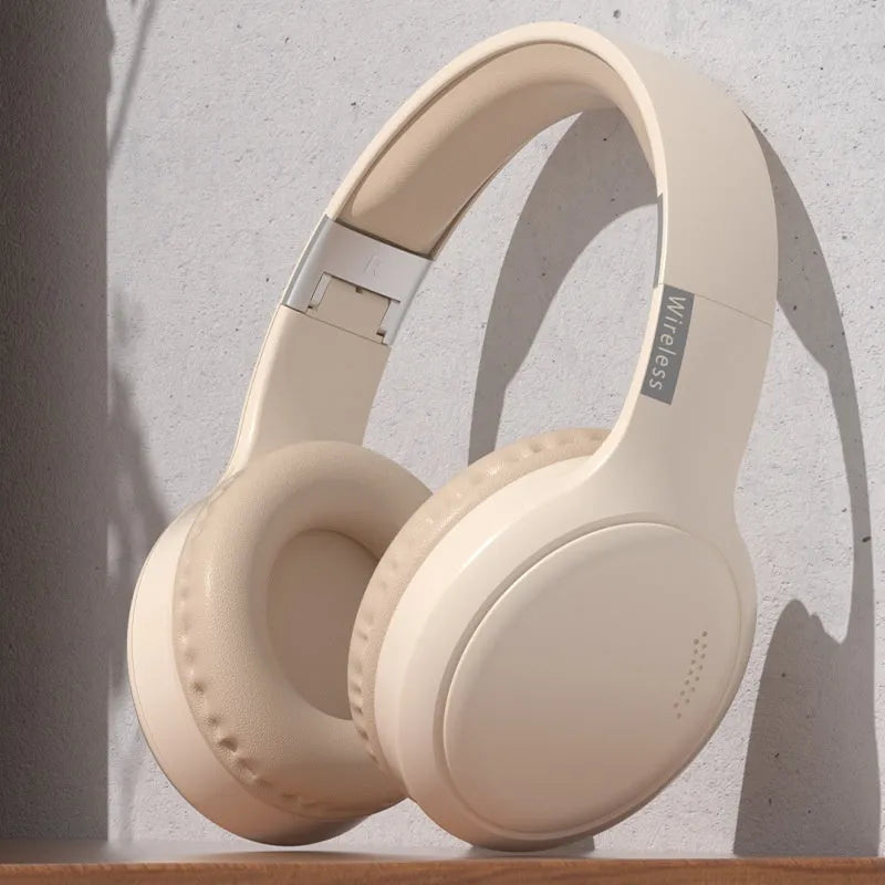 V10 Bluetooth headset wireless in milky white, lightweight ABS material, head-mounted design
