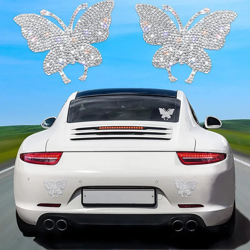 White diamond-encrusted glass car sticker with butterfly and bear claw design measuring 7x6 cm