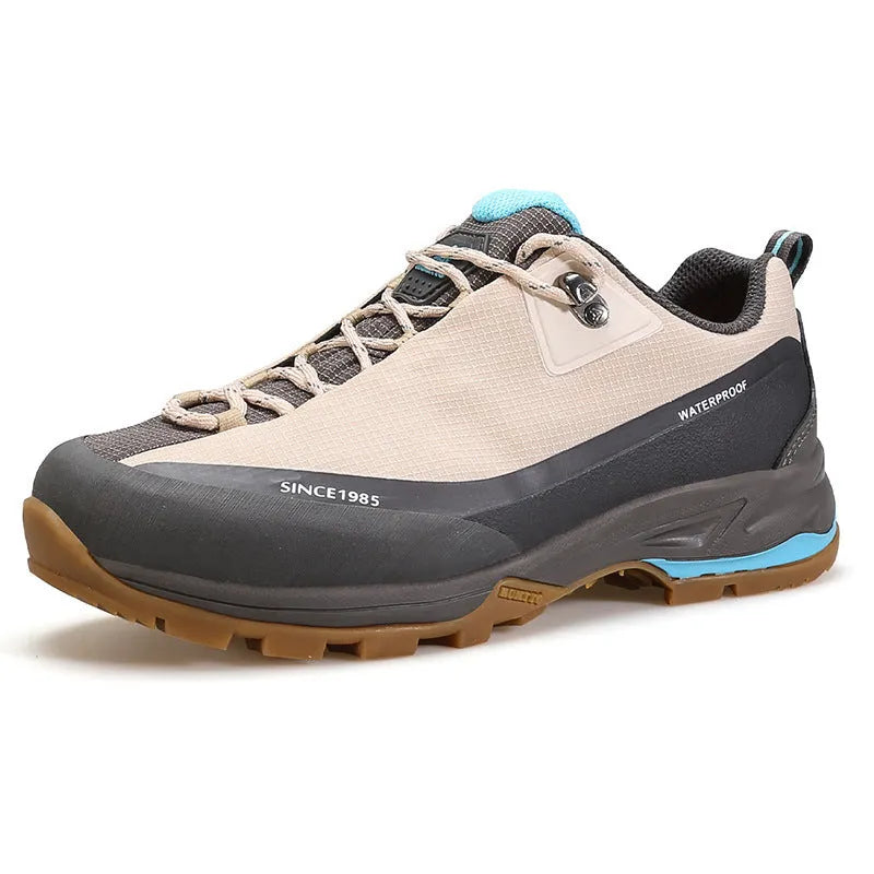 Men's low-top leather mesh hiking boots with front laces and a non-slip rubber outsole