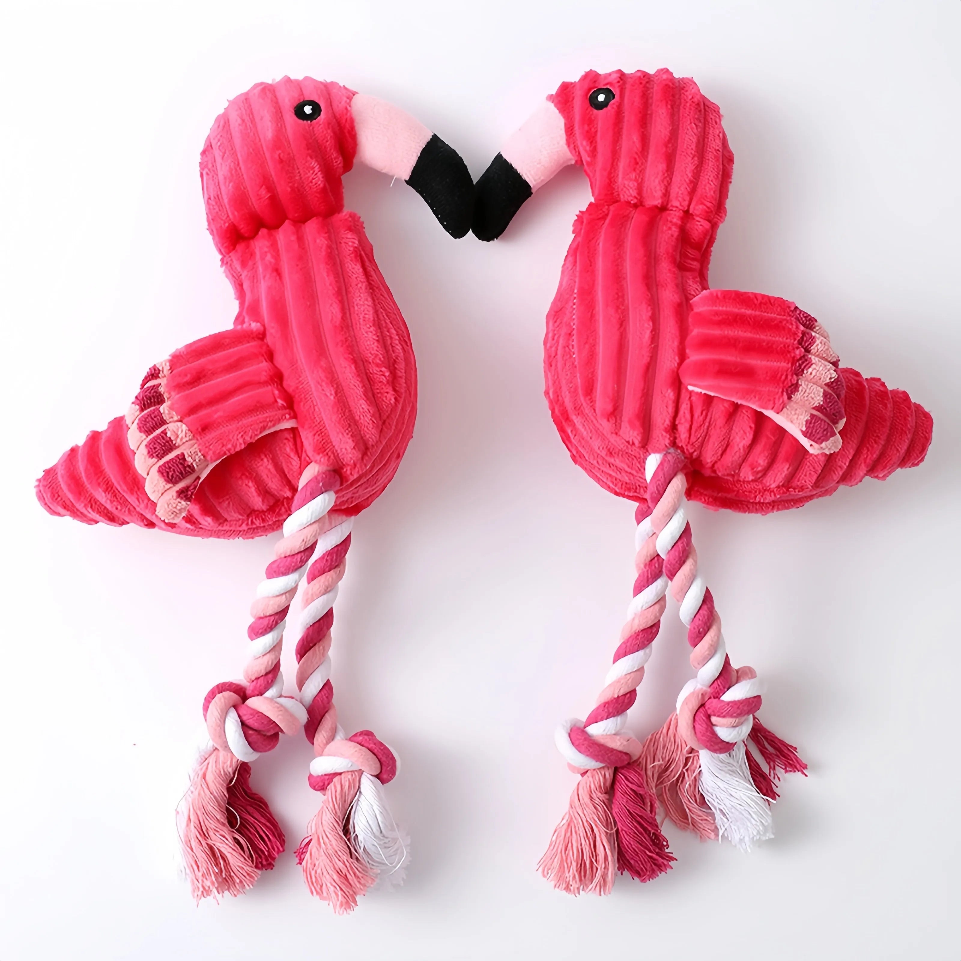 Pink corduroy animal-shaped squeaky dog toy with plush fabric and built-in squeaker