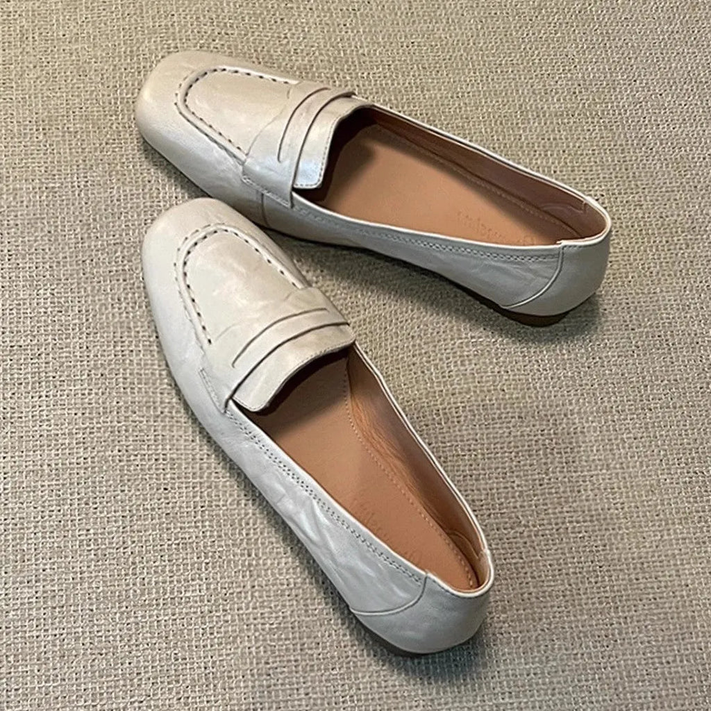 Women's flat square toe leather shoes in Beige White with low heel and cowhide lining on a plain background