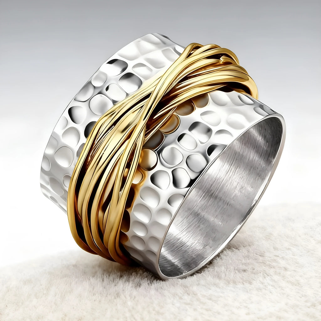 Alloy hammered metal coil ring with electroplated two-tone finish available in sizes 6 to 10