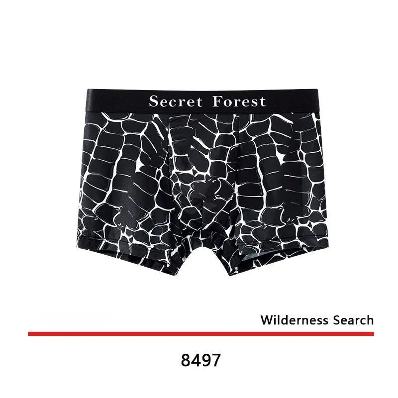 Men's thin loose knitted polyester boxer shorts in black, grey, and brown colours on a mid-waist model.