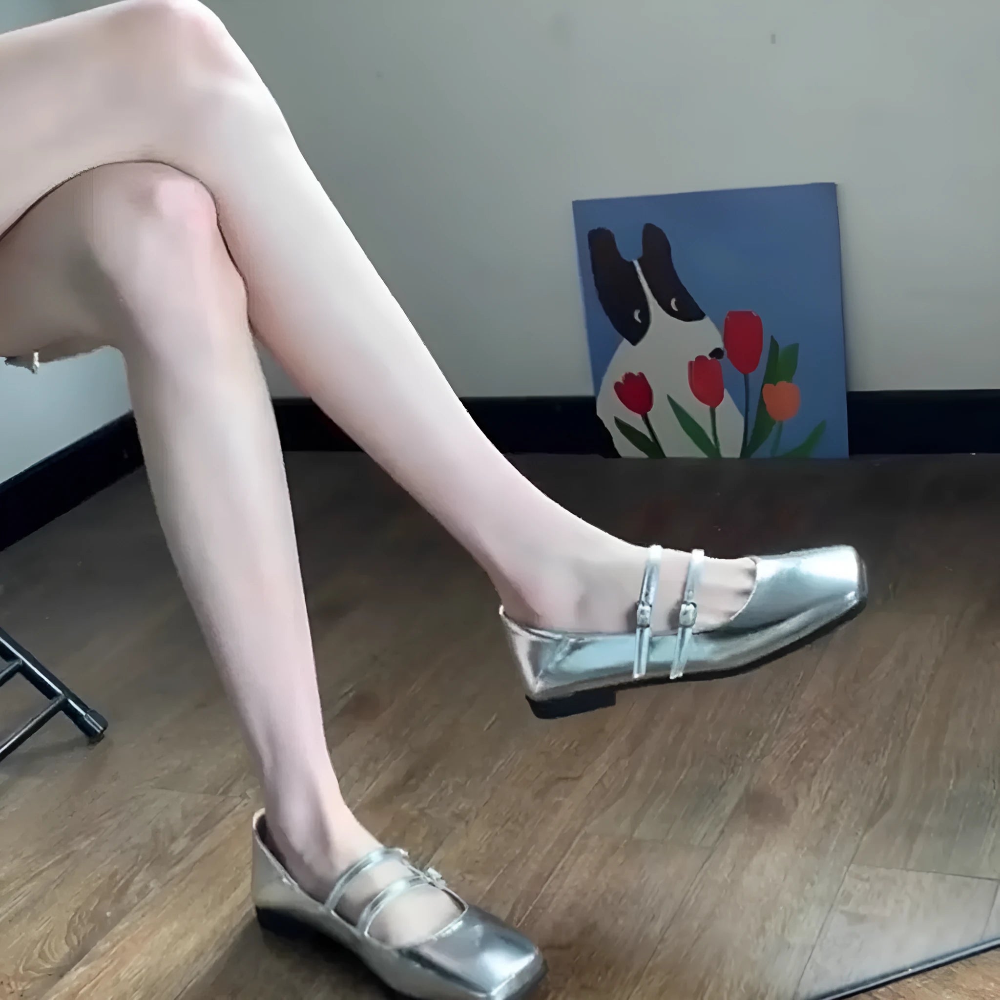 Women's silver genuine leather Mary Jane shoes with a cross buckle strap and flat low heel.
