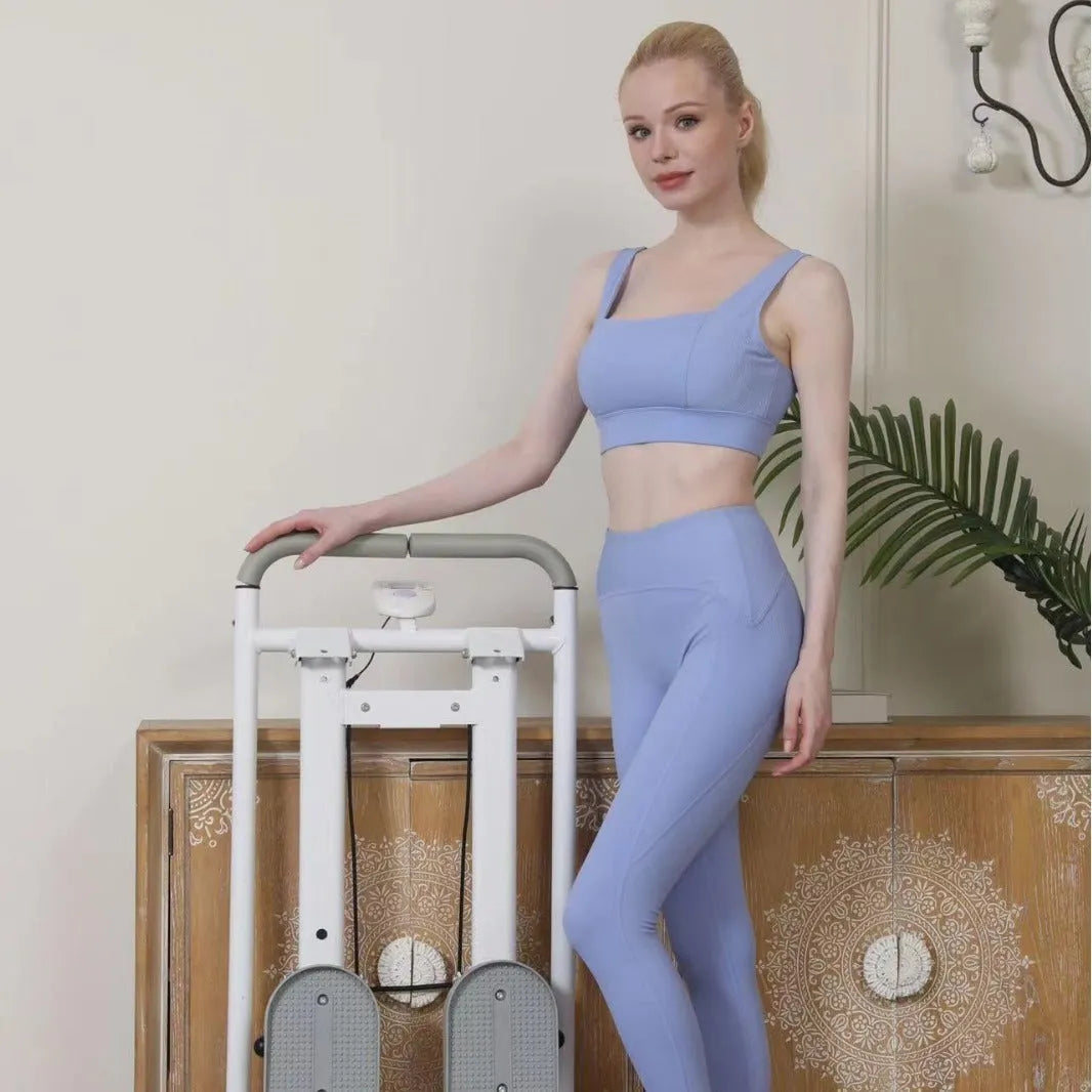 White foldable treadmill with integrated climbing frame for home fitness