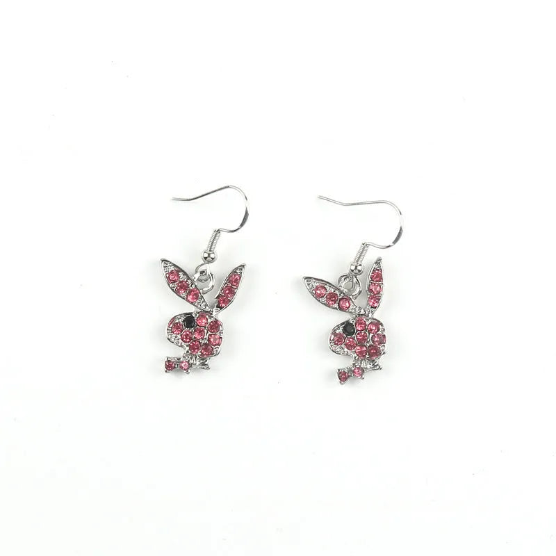 Close-up of cute full diamond rabbit stud earrings in alloy, showing gold, pink, and silver colour options.