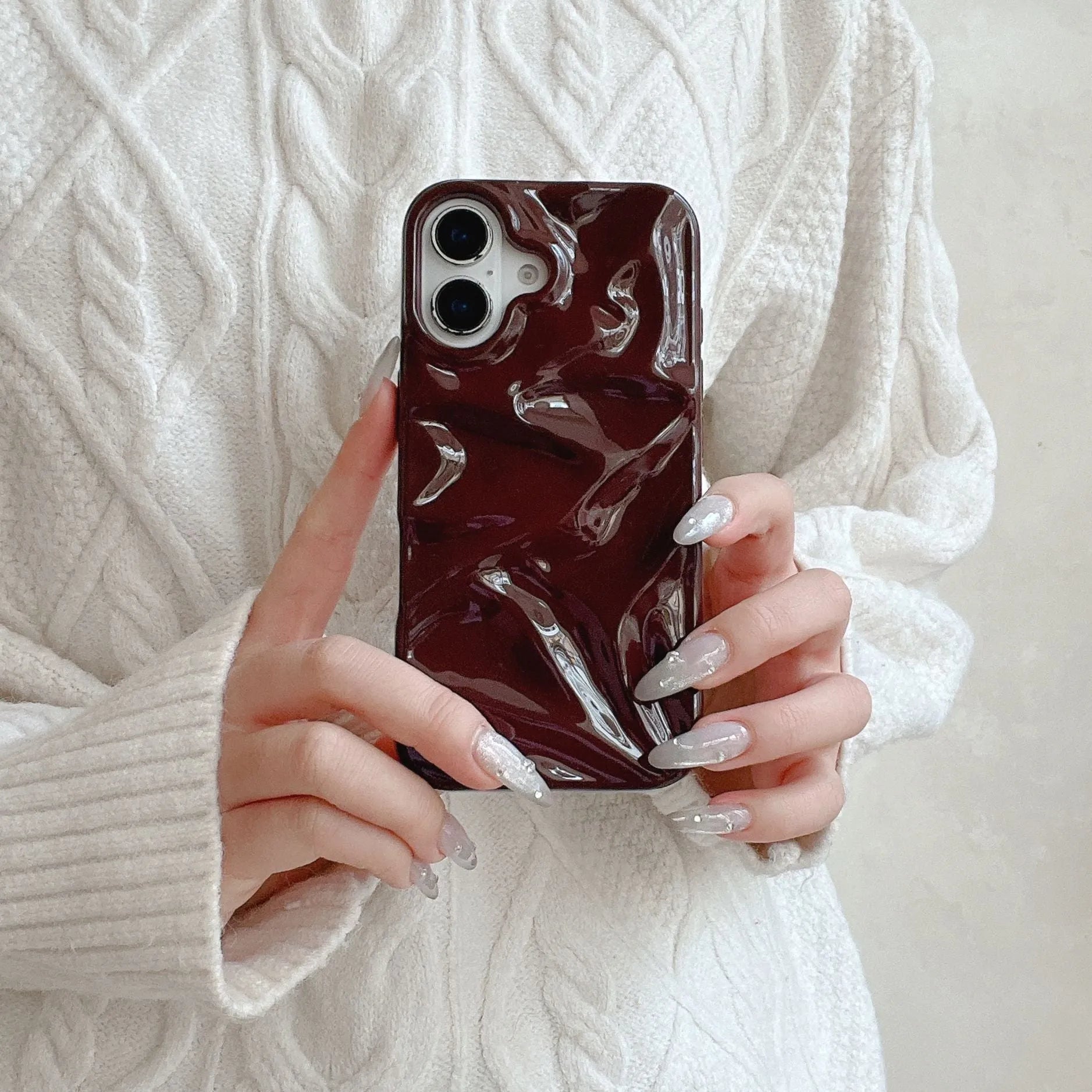 Niche irregular pleated three-dimensional TPU phone case in wine red for iPhone