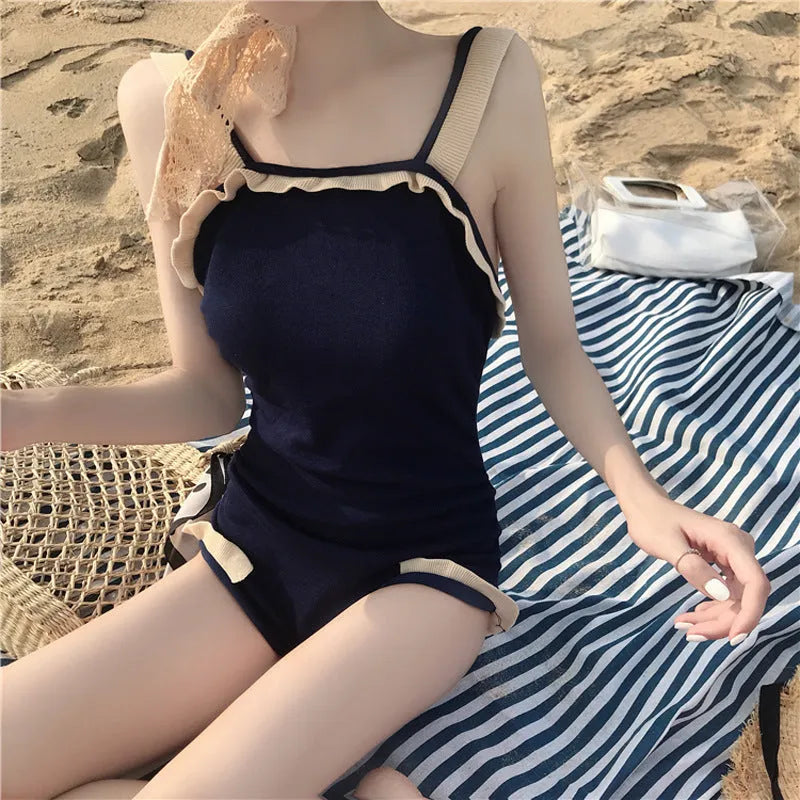 Conservative women's one-piece swimsuit in nylon fabric showing colour options