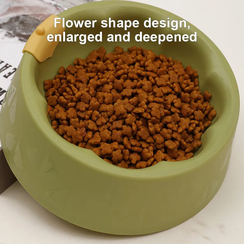 Green plastic double pet bowl with flower-shaped feeding areas and anti-tipping base design