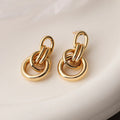 Women's geometric copper earrings with gold colour finish and irregular shapes