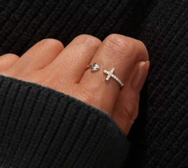 S925 sterling silver love cross women's open ring in white gold and rose gold on white background