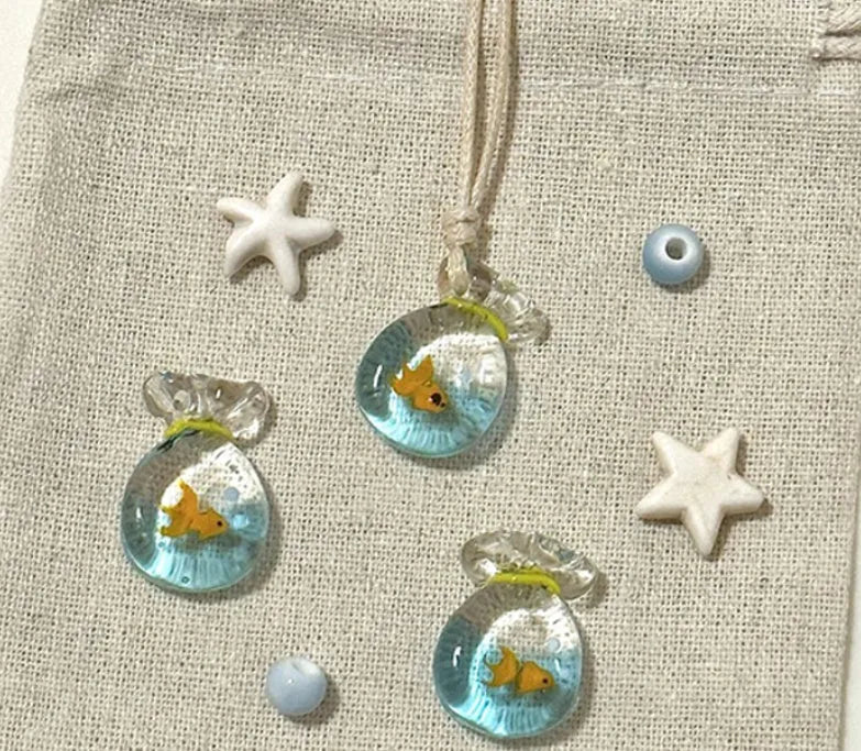 Women's skirt and joker pendant necklace with coloured glaze on cotton linen chain