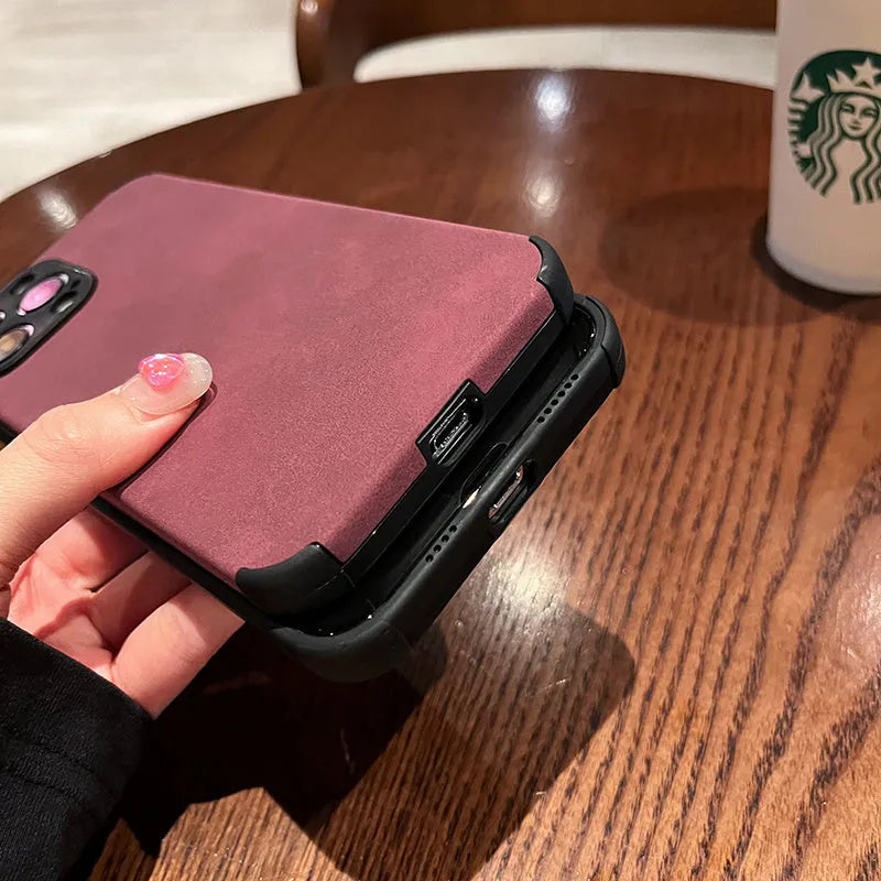 Simple solid colour fur phone case with imitation leather texture for iPhone fall prevention, available in black, blue, and green
