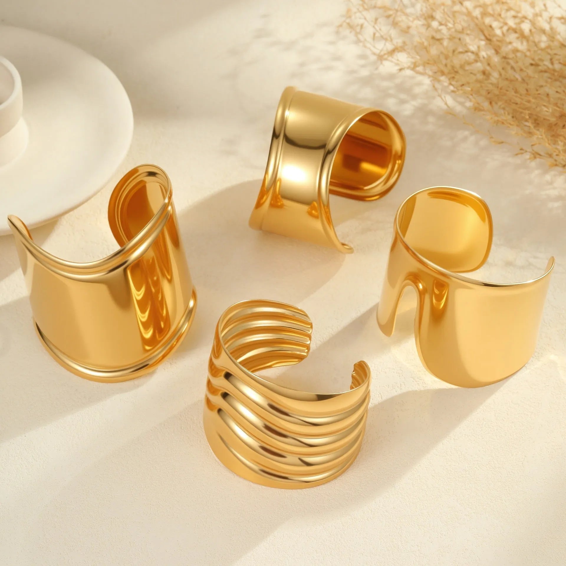 Women's exaggerated wide gold-plated bracelet with wave geometric design and niche opening