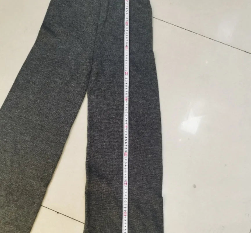 Women's acrylic knit suit set with side-slit sweater and matching trousers in dark gray