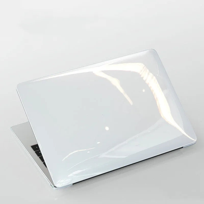 Transparent PC protective case for MacBook Pro 14-inch laptop on table