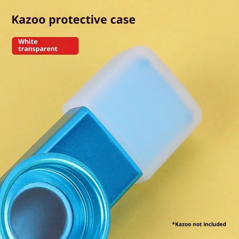 Metal kazoo in Flame Red with paper tube against a white background