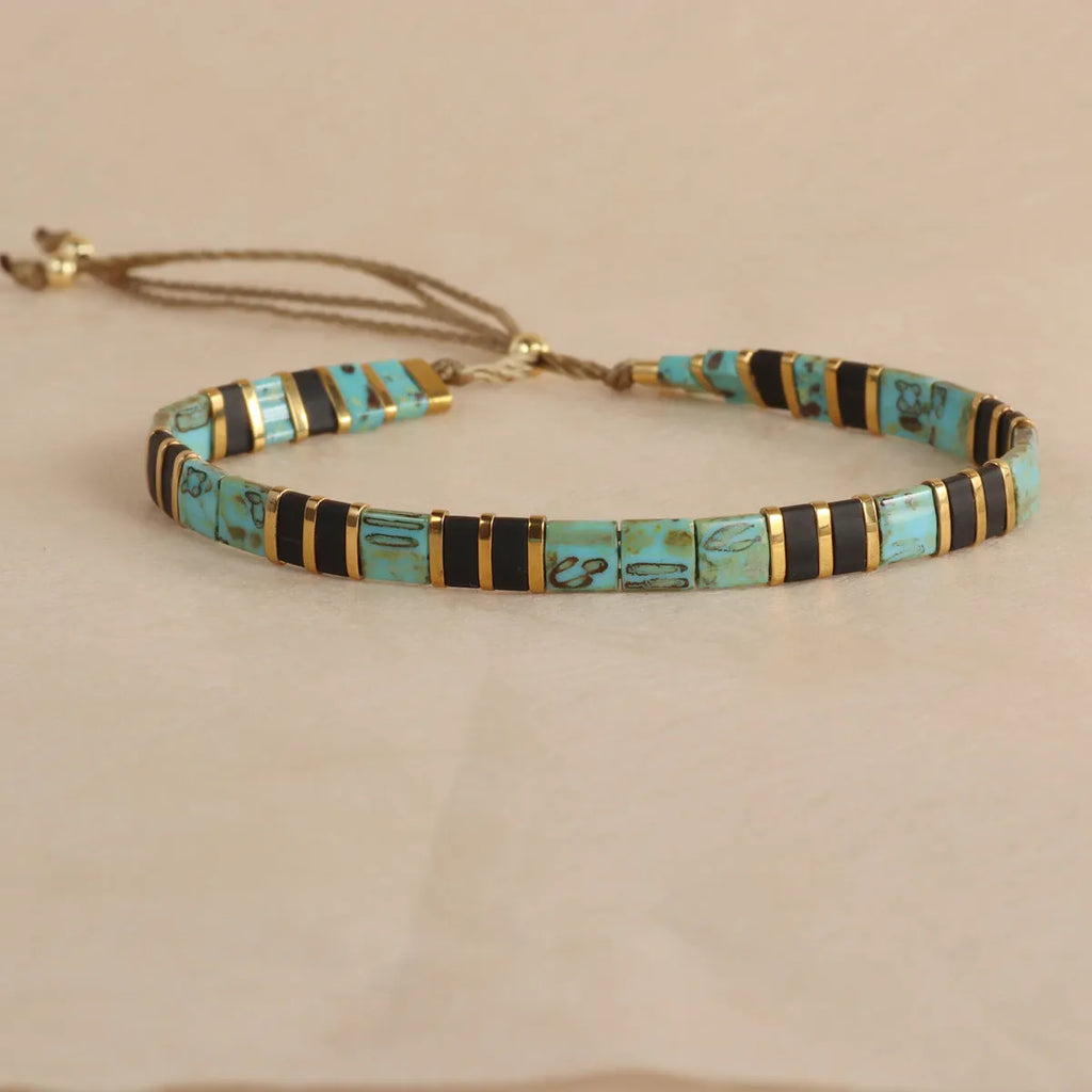 Geometric glass bead bracelet with pull adjustment in five colour options