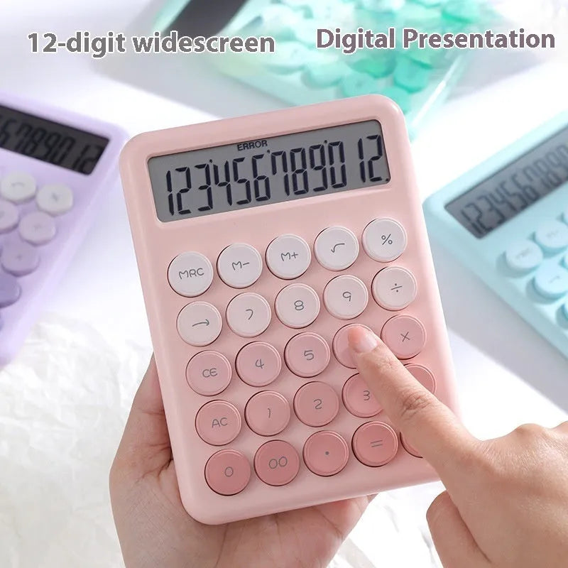 Dopamine gradient colour desktop calculator in violet, pink, blue, or green on a desk.