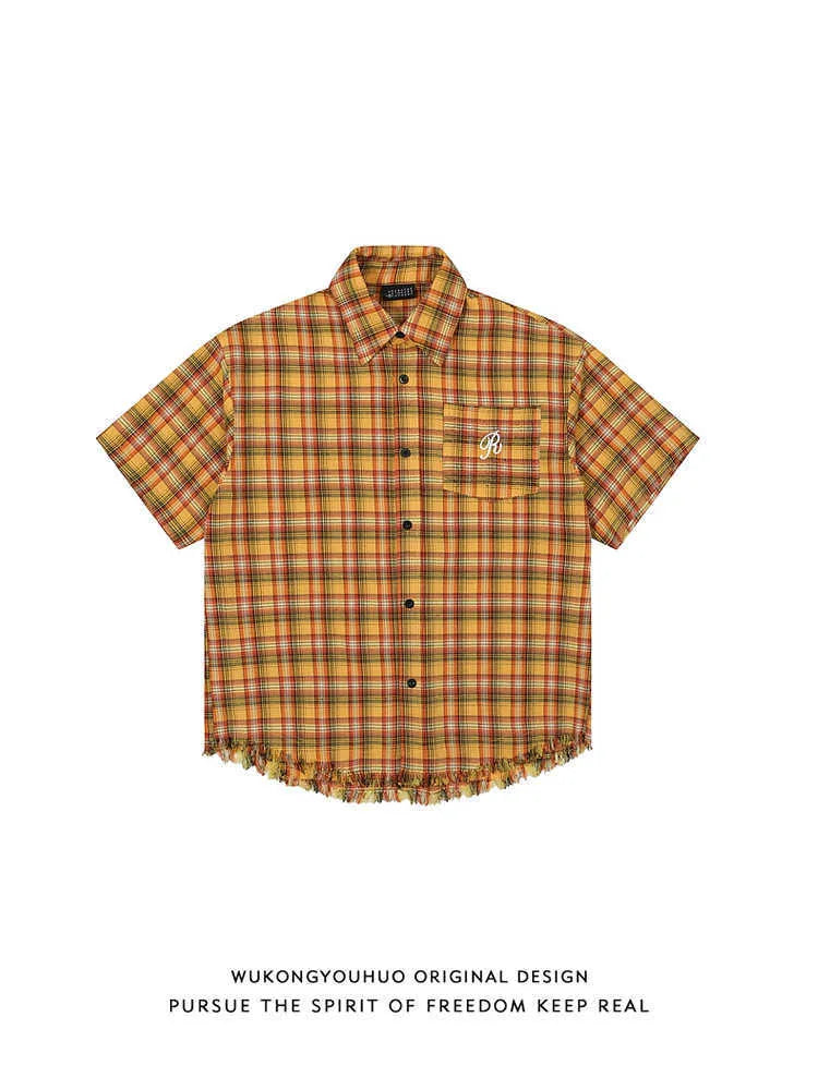 Yellow plaid short sleeve shirt with embroidered pocket detail in loose fit