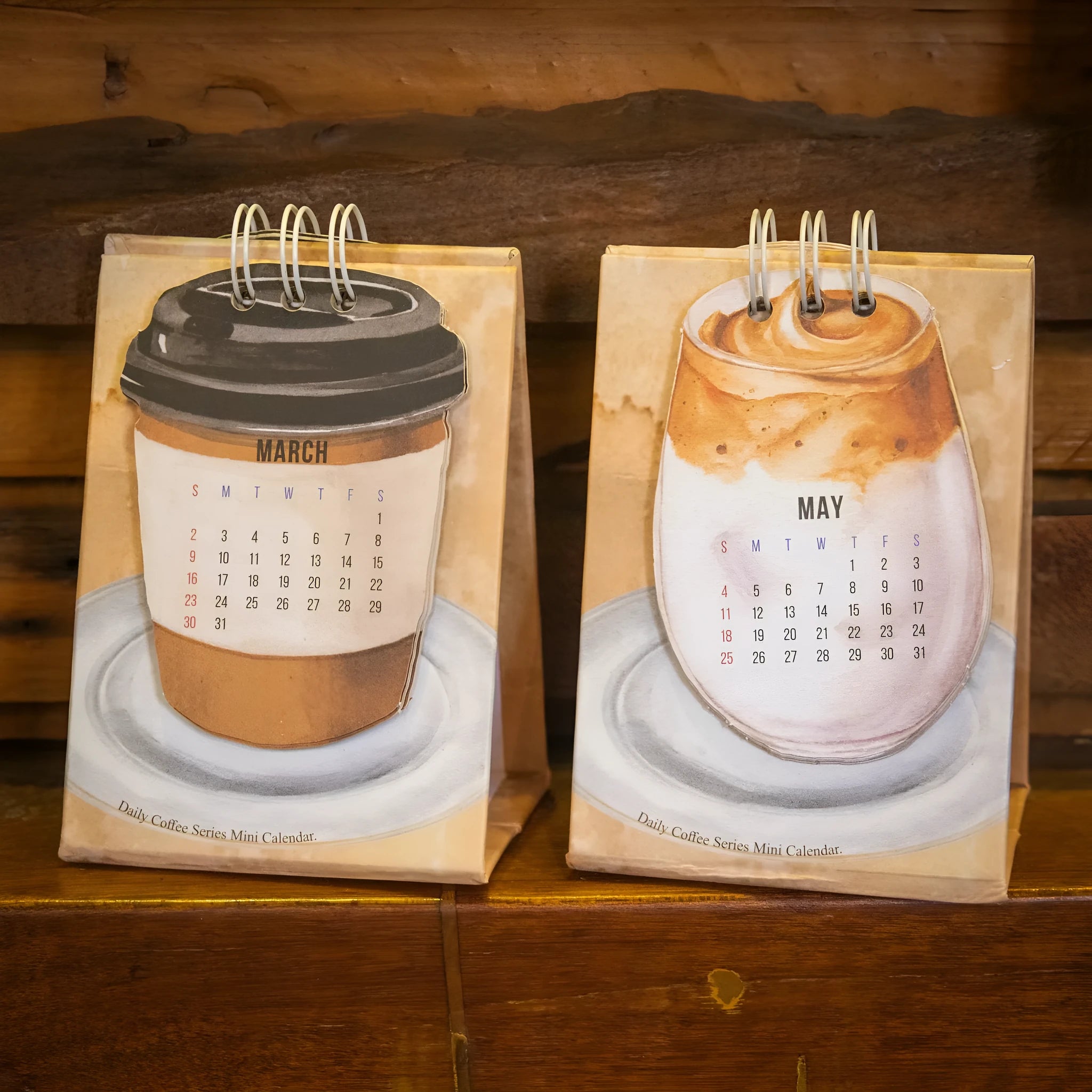 2025 mini desk calendar set showing ten different paper designs including Coffee Time and Life Is Not Easy.