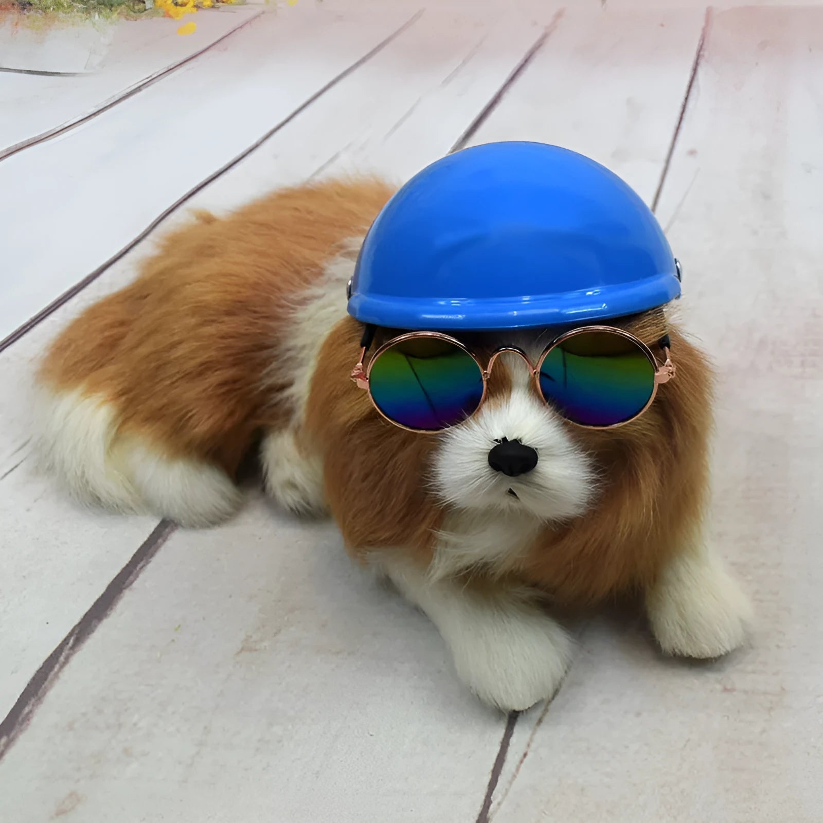 Plastic dog motorcycle helmet shown in multiple solid colours including pink, blue, and yellow, with size examples.