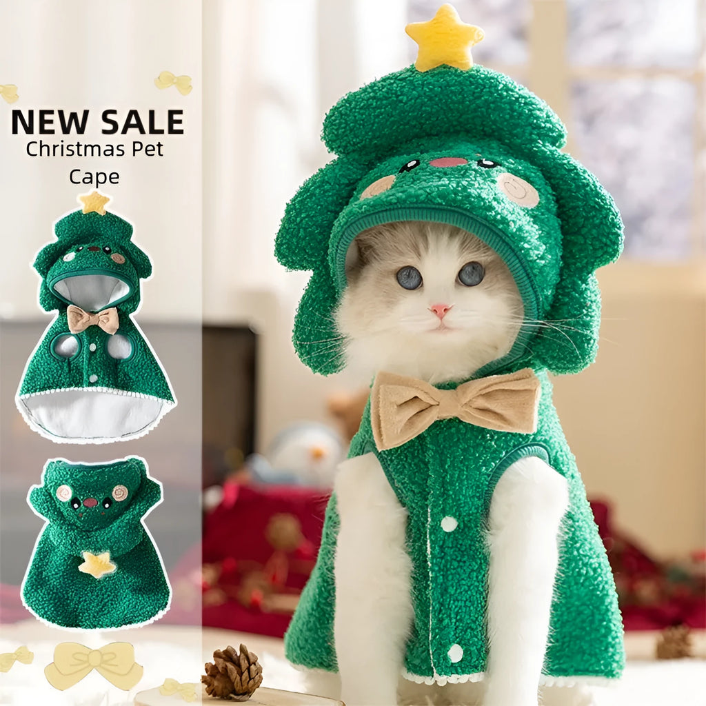 Green granular velvet cat cape with Christmas tree hat and star, lying on a white background
