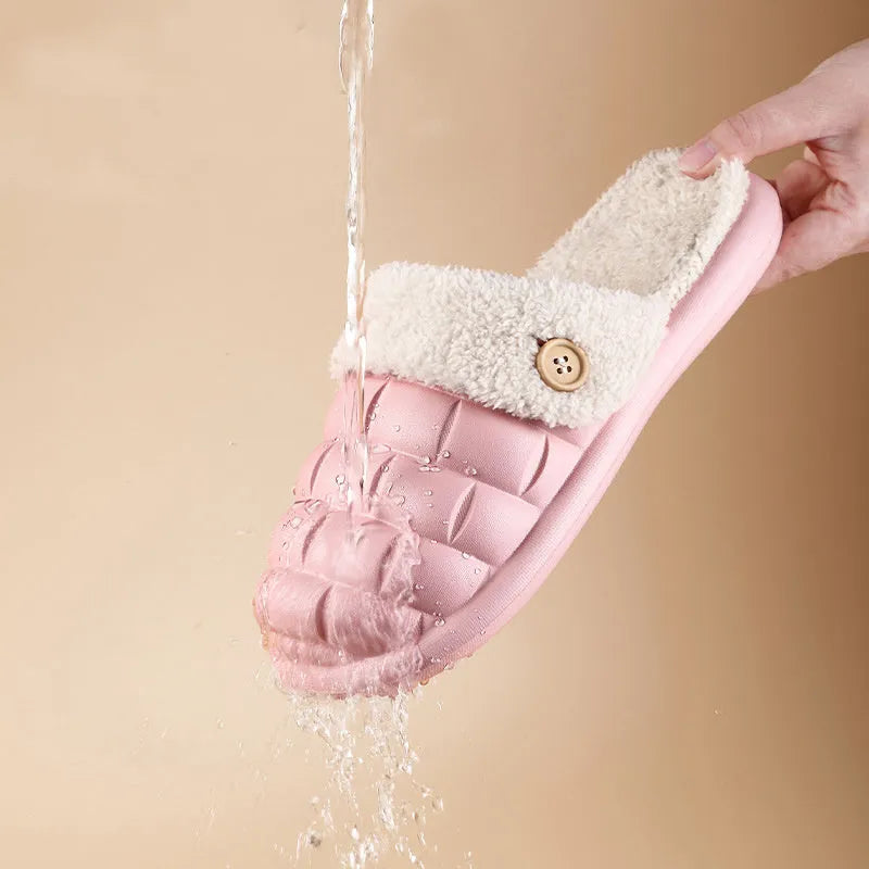 Plaid patterned EVA detachable slippers with plush lining, shown in pink, on a plain background.