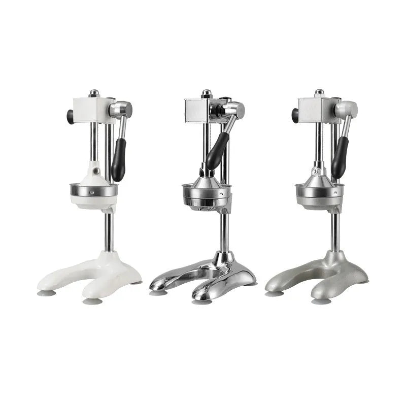 Stainless steel manual vertical citrus juicer on a kitchen counter, shown in a selected colour with a pointed tip head.