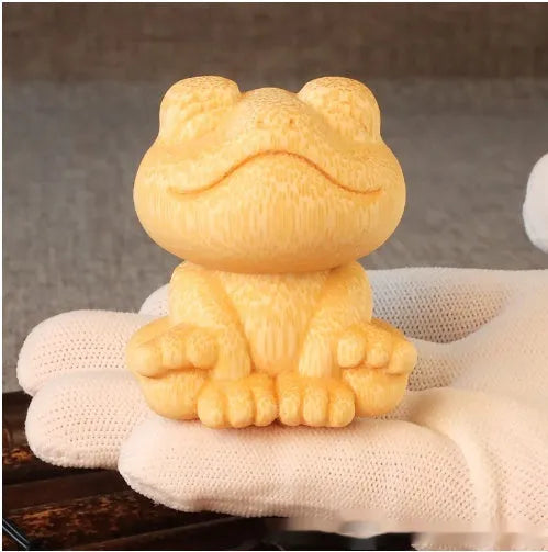 Solid bamboo smiling frog carving ornament with cartoon cute style measuring 5cm tall